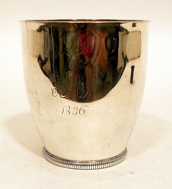 A small unseamed coin silver beaker, by William Moulton IV, Newburyport, MA.