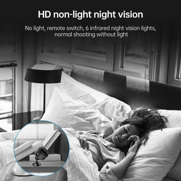 Infrared night vision camera monitoring a sleeping woman.