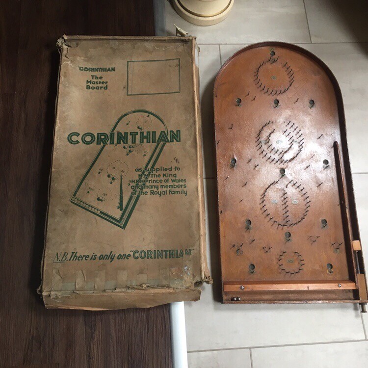 Old wooden bagatelle game with original box in Saffron Walden, Essex