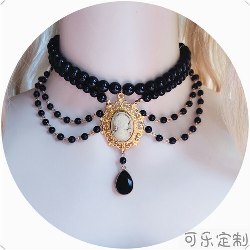 Gothic pearl necklace deals