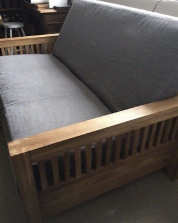 Beautiful Oke range 2 seater solid oak futon/sofa bed in mint condition