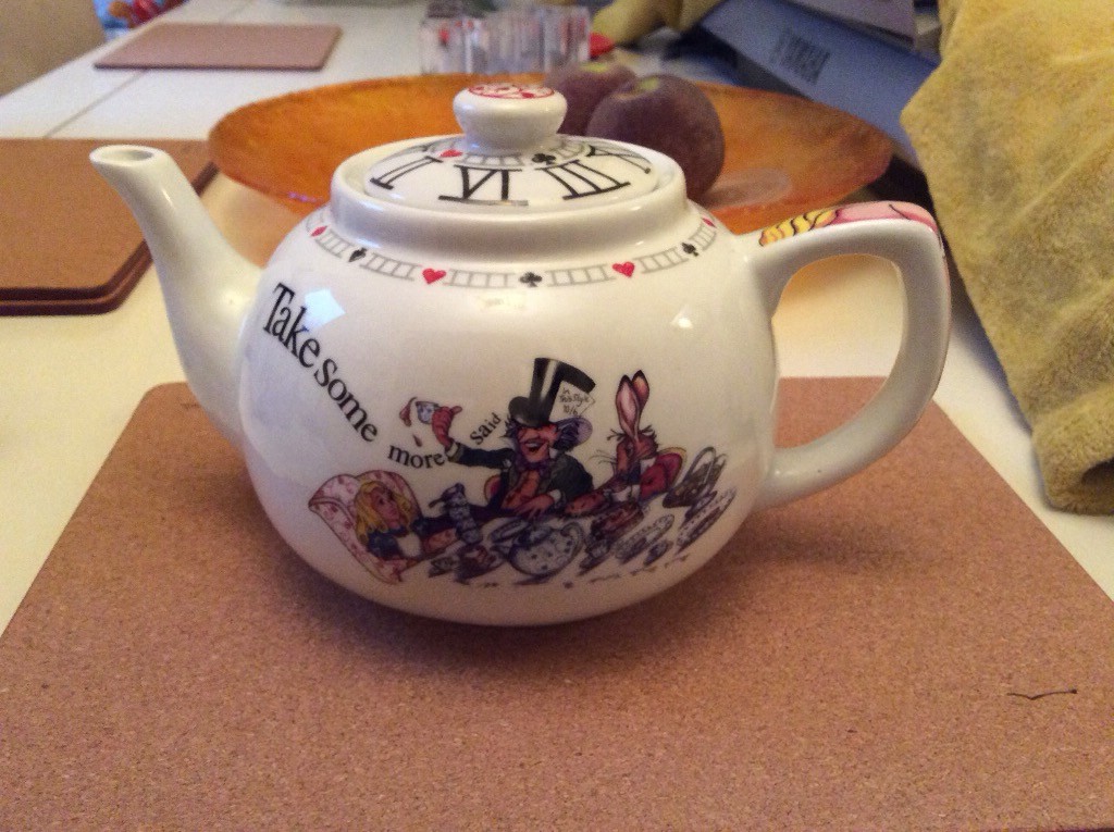 Paul Cardew Alice in Wonderland teapot and 4 mugs, signed and in