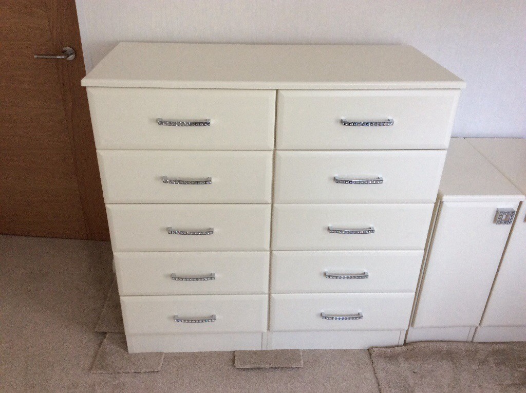 Tall chest of drawers, with matching slimline bedside cupboards in