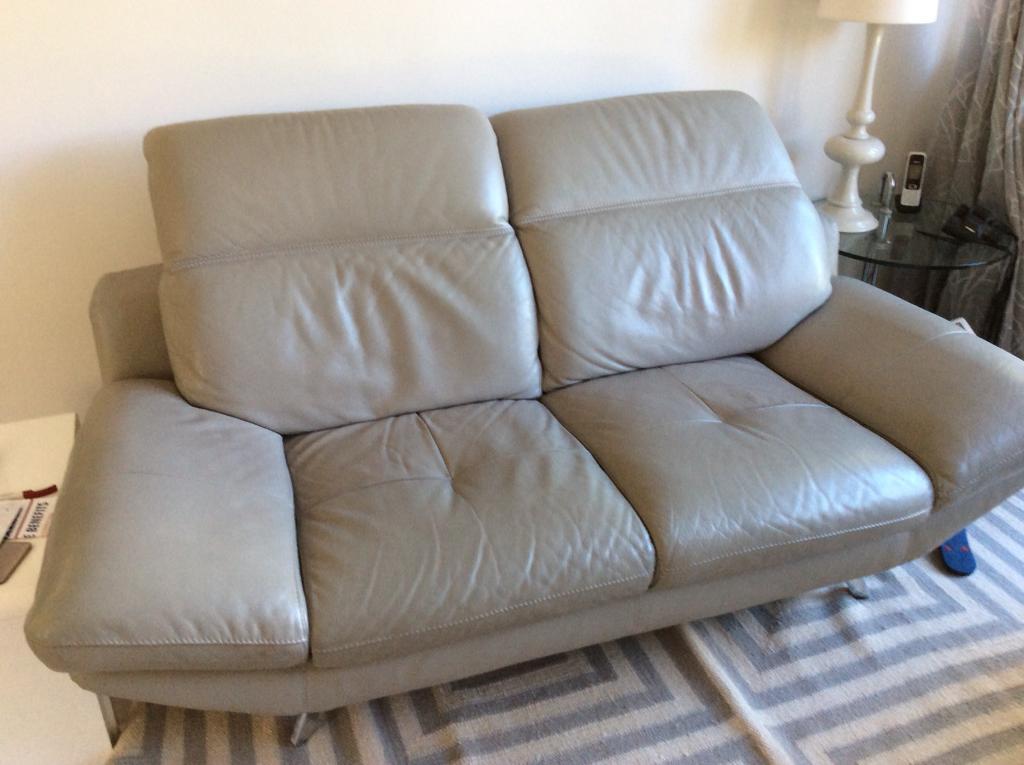 Grey leather two seater sofa in Farnham, Surrey Gumtree
