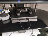 PlayStation 4 slim excellent condition with near brand new controller and original charging cable 