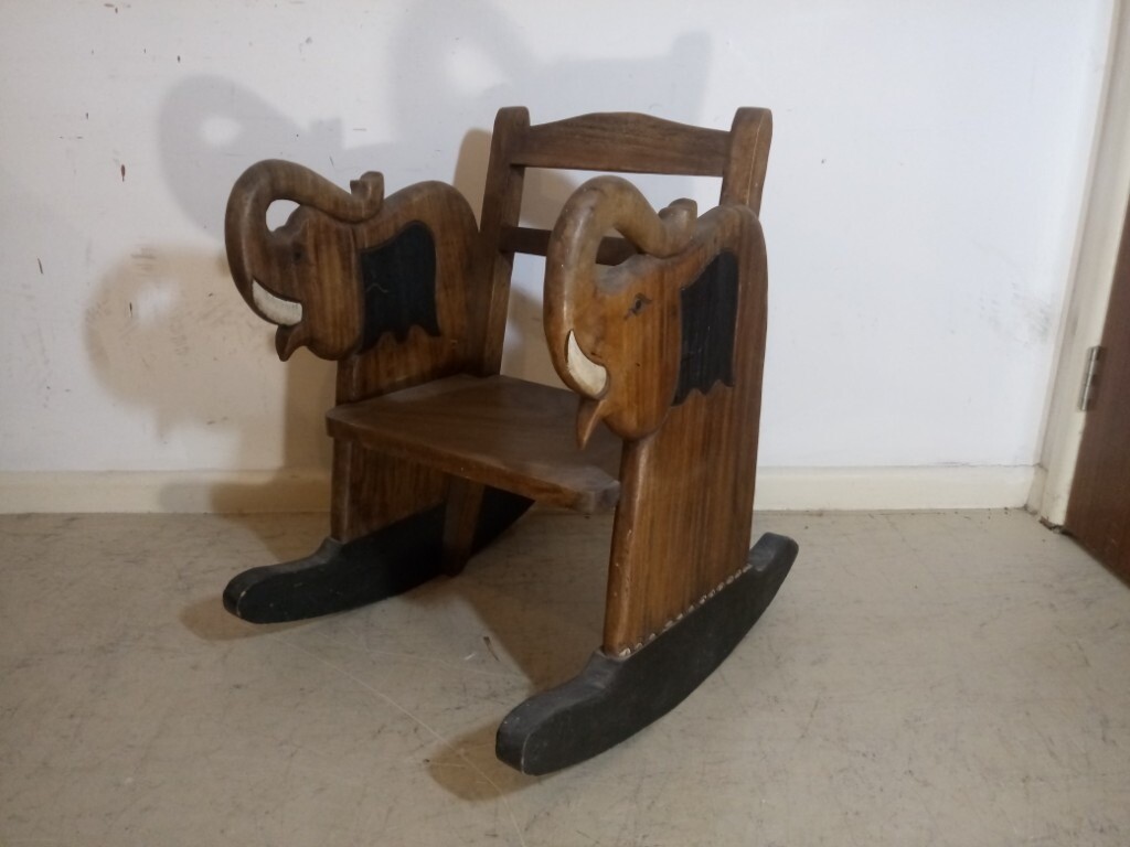 Child's Solid Oak Hand carved elephant rocking chair in good condition