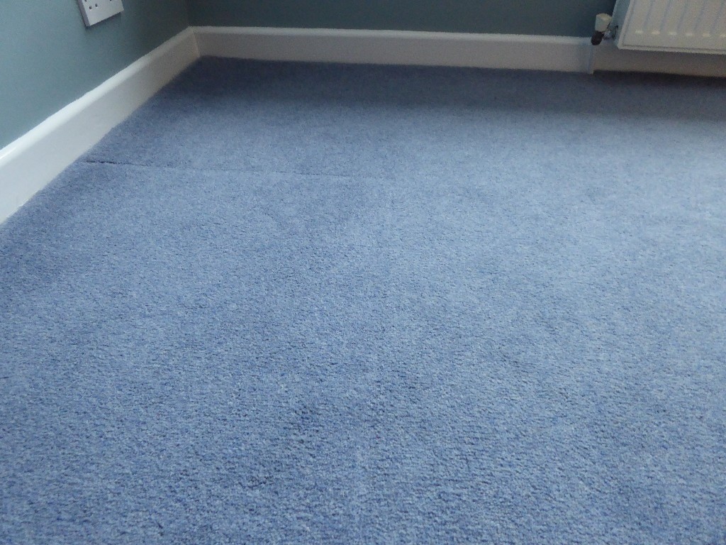 BLUE 80/20 WOOL MIX TWIST SECOND HAND CARPET in Ferndown, Dorset