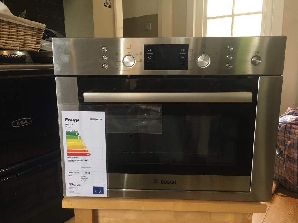 Bosch Combi microwave stainless steel oven brand new ex display. HBC84e