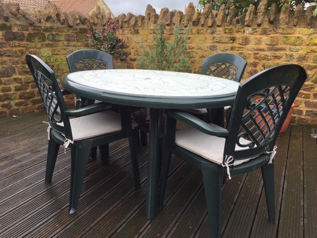 Garden Patio Furniture (Plastic) - 1 x Table, 4 x Chairs, 4 x Cushions