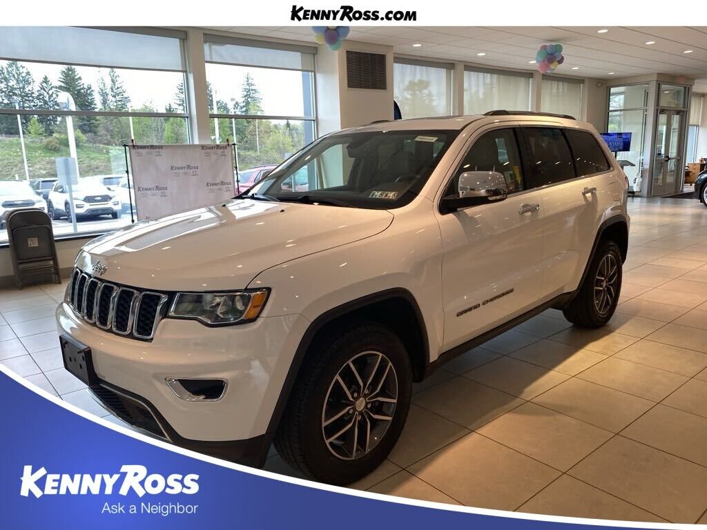 Bright White Clearcoat Jeep Grand Cherokee with 72385 Miles available now!
