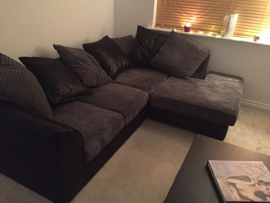 grey suede and black leather sofa