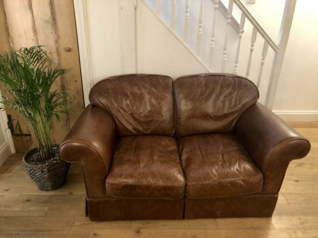 Two Seater Brown Leather Laura Ashley Sofa in Lymm, Cheshire Gumtree