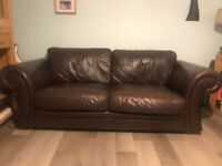 Two 3 seater brown leather sofas