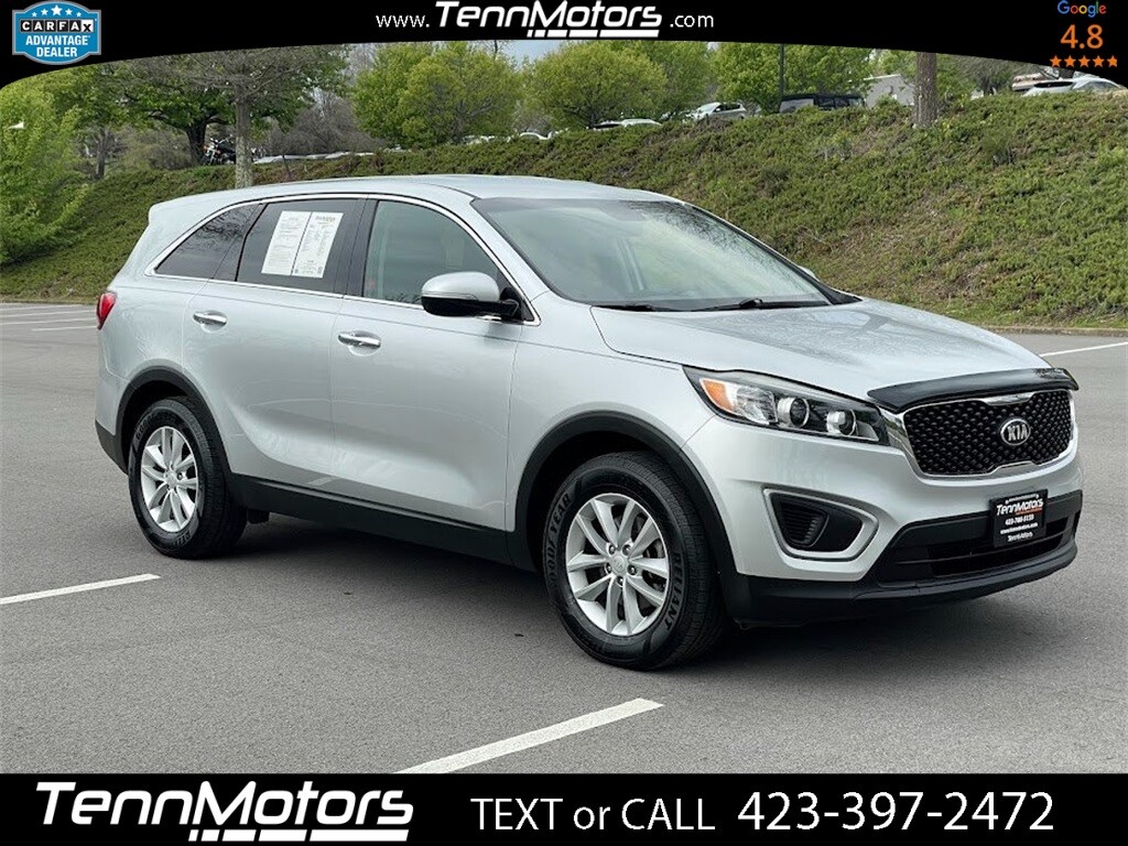 Sparkling Silver Kia Sorento with 87507 Miles available now!