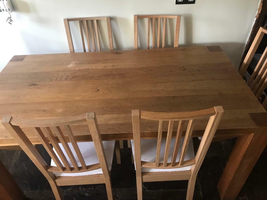 Solid oak dining table and 8 chairs | in Drighlington, West Yorkshire