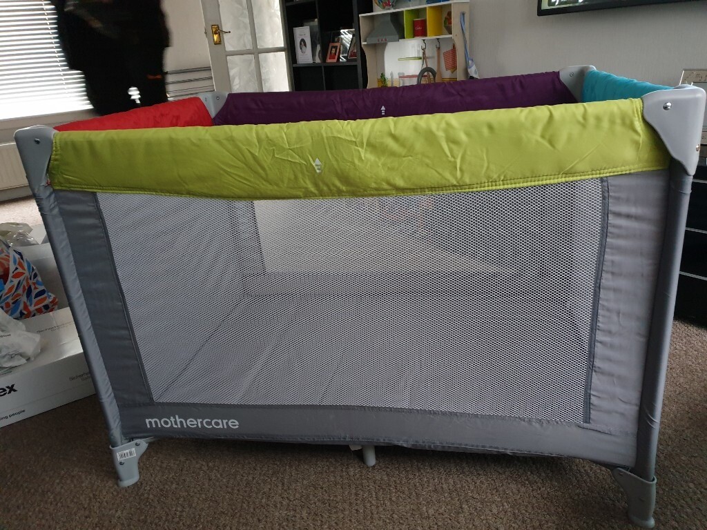 Mothercare Grey/multi coloured travel cot in East Kilbride, Glasgow