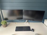 Dell Screens P2719H and Human Scale dual screen silver and white monitor arms and docks
