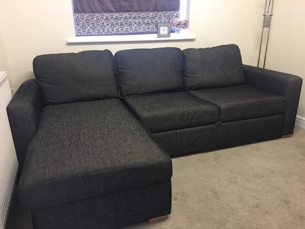 Charcoal grey corner sofa bed with armchair in Leamington Spa