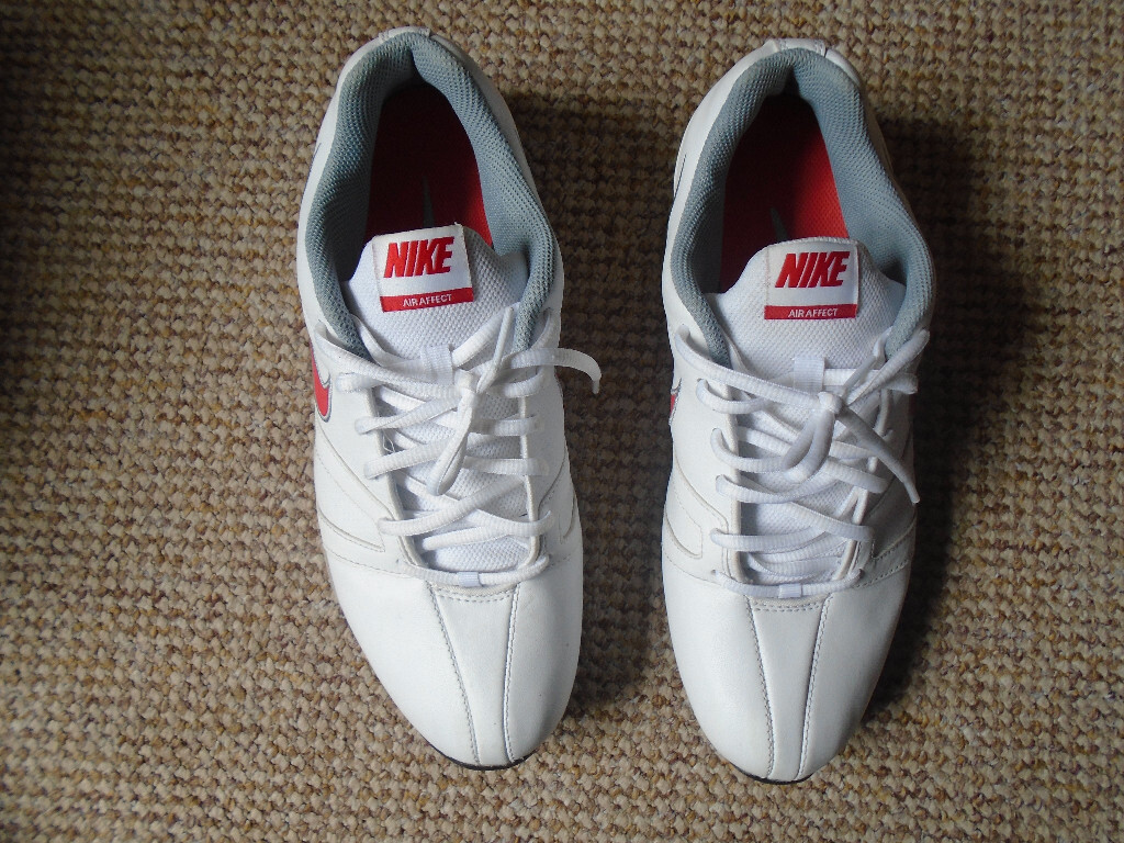 a PAIR of WHITE NIKE AIR AFFECT TRAINERS, SIZE UK 9.5, EUR ...