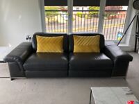 3 seater, black leather, power reclining sofa.