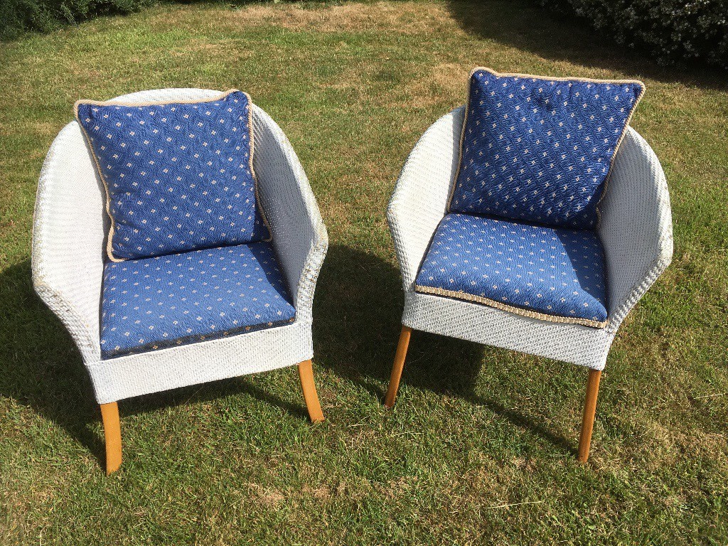 Pair of Lloyd Loom style chairs with cushions in Lymington, Hampshire