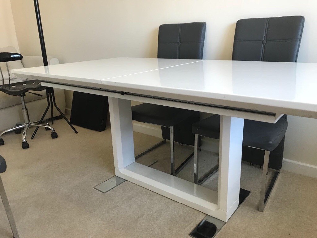 White high gloss extendable dining table and 6 chairs | in Lisvane