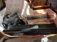 PlayStation 3, 15 games and 2 controllers