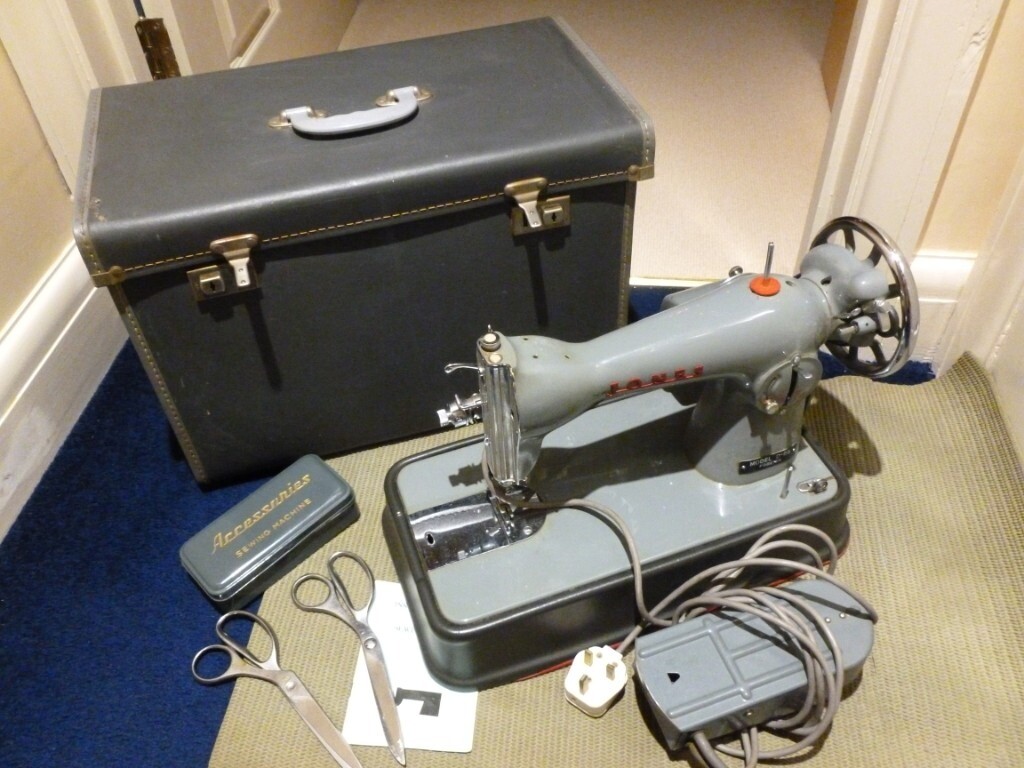 Vintage Jones D65 sewing machine with lockable carry case and
