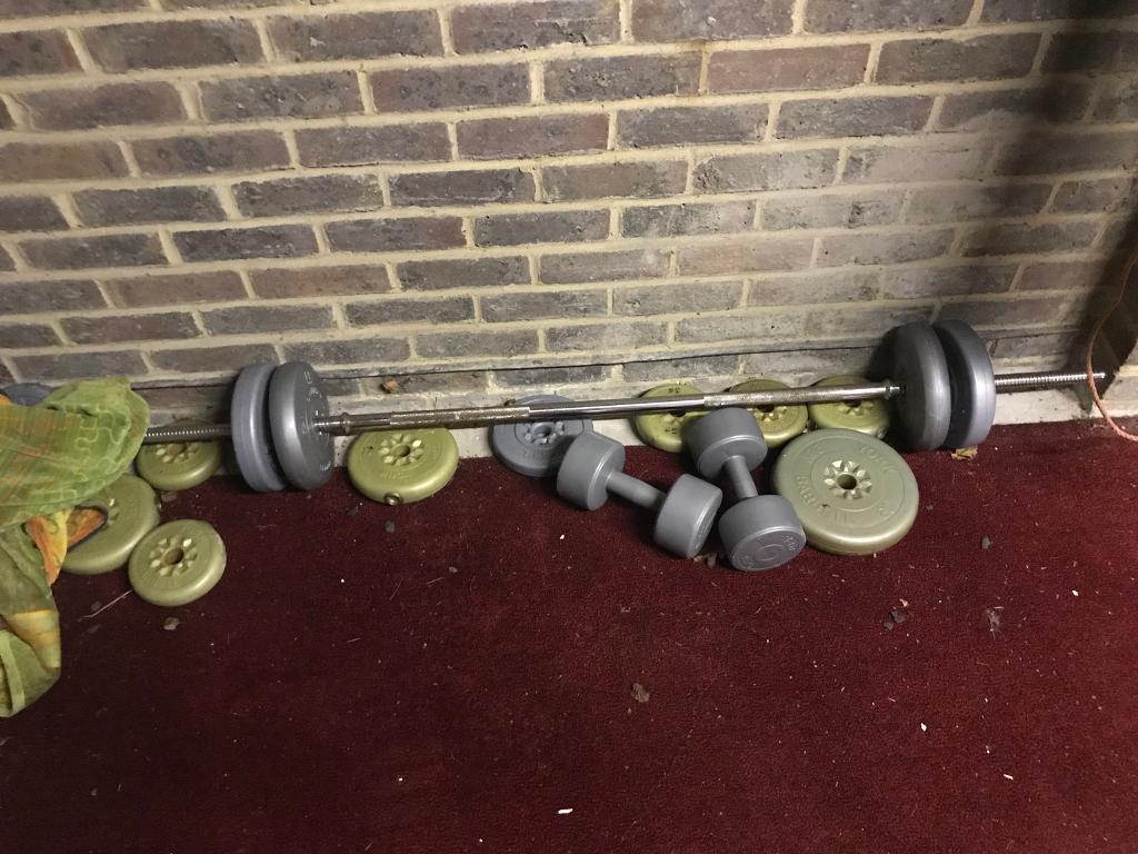 Exercise ball , plastic dumbbells, bar and plastic weights weights