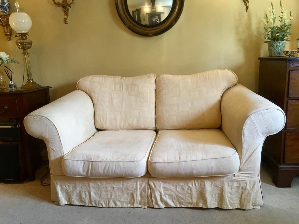 Free for collection. Two seater sofa with two sets of loose covers in