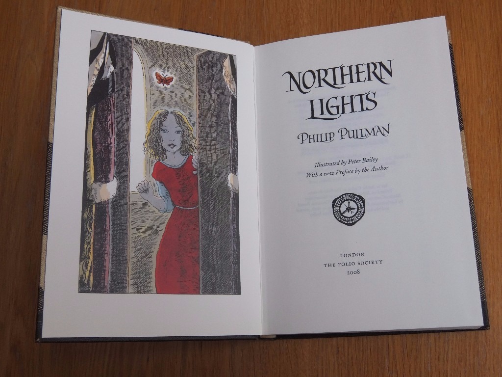 His Dark Materials trilogy by Philip Pullman. Fine illustrated books in slipcase, Folio Society