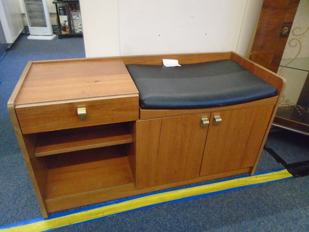 small telephone table with seat a drawer and cupboard. in Fforestfach