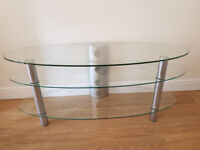 NEXT TV STAND – POLISHED GLASS AND SATIN/BRUSHED-FINISH METAL.
