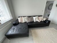 Black leather corner sofa
