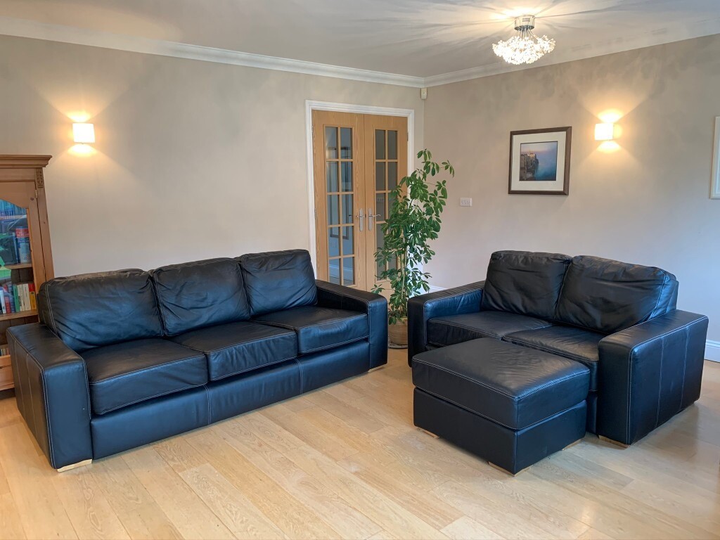 Black leather  IKEA  SOFA  and BUFFET set  in Bookham 