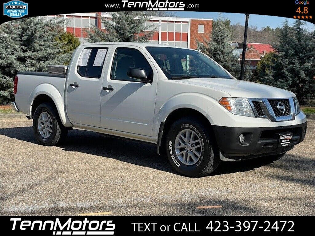 Glacier White Nissan Frontier with 112873 Miles available now!