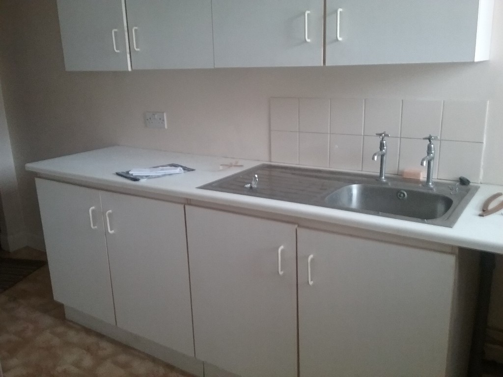 White utility units and stainless steel sink | in Omagh ...