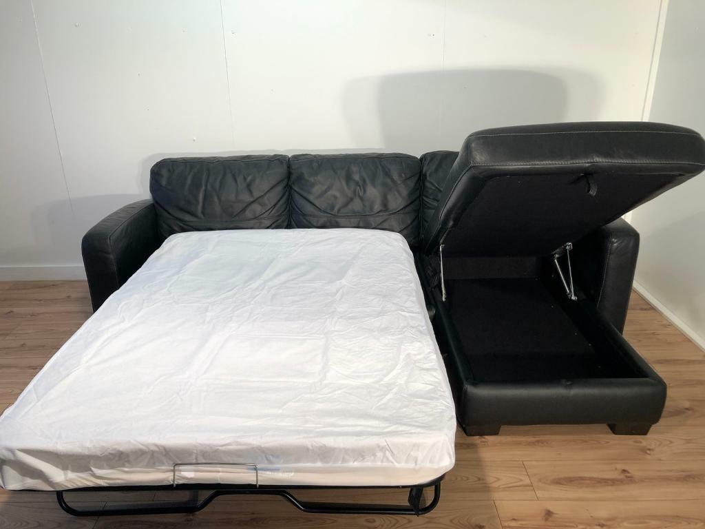 Black real leather corner sofa bed with free delivery within London