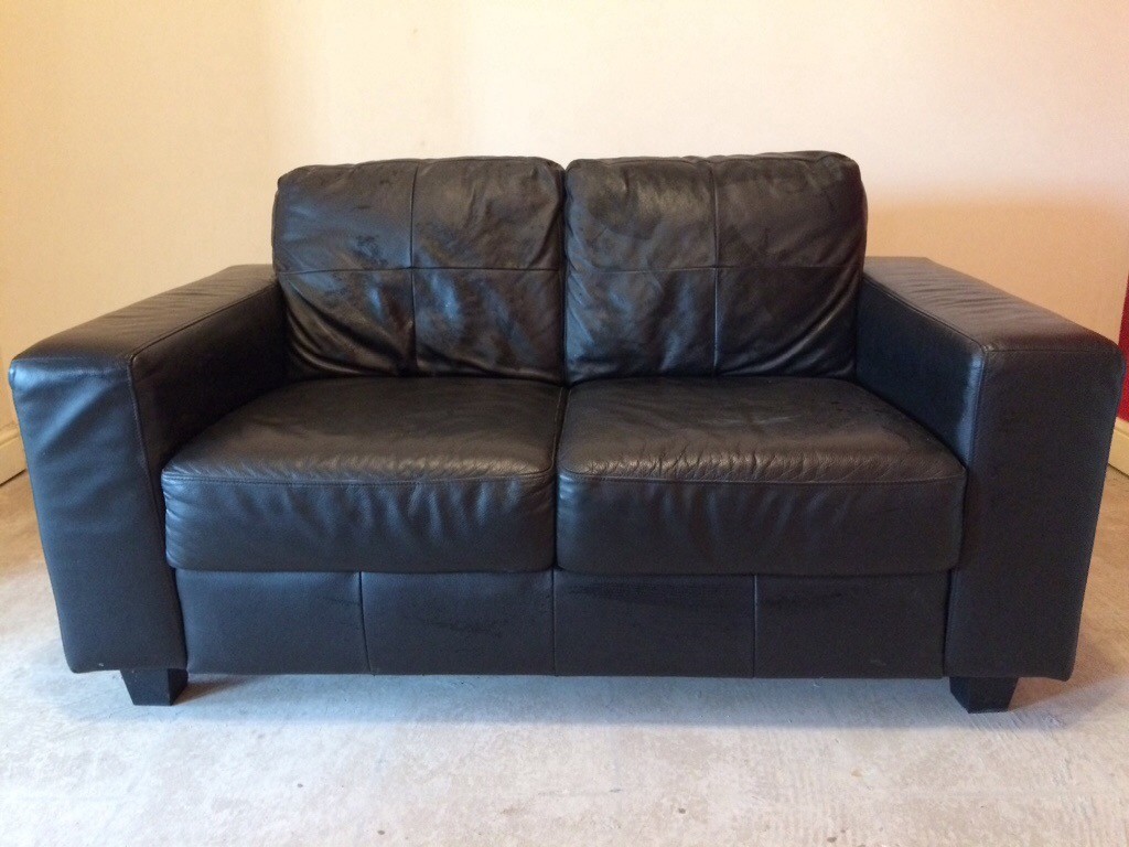 Reduced for a quick sale! Two black leather Ikea sofas both in