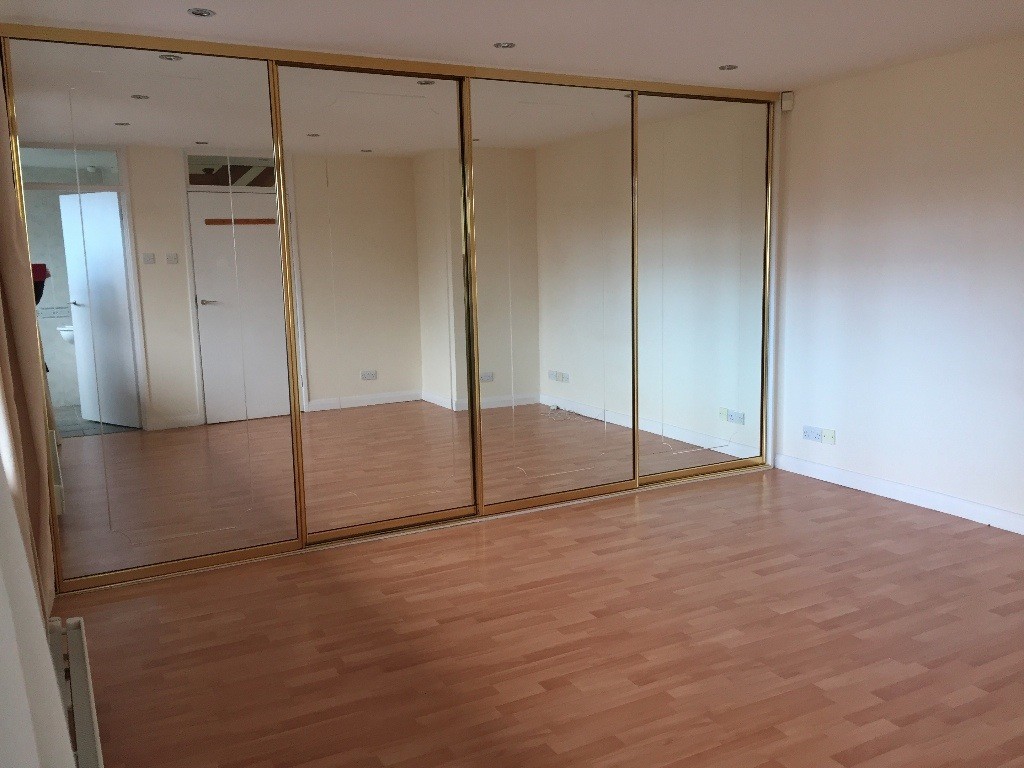 Metal Framed Mirrored Sliding Wardrobe Doors In Ascot Berkshire