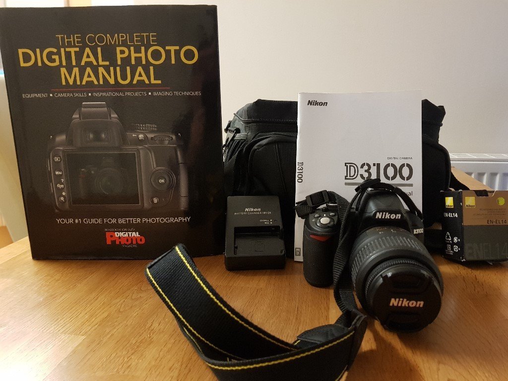 Nikon D3100 SLR Digital Camera with Carry Bag Spare Battery and Charger 8GB  Mem Card Manual + Book