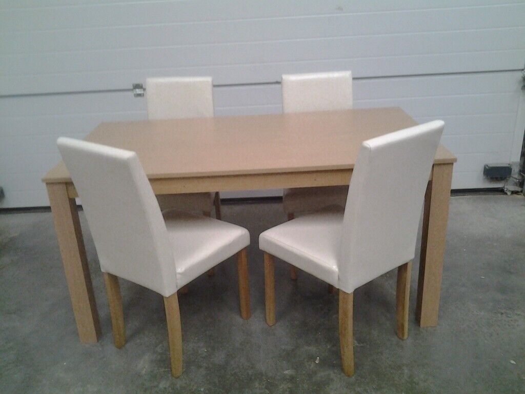 Ex display Bargain Dining table with 4 cream faux chairs 