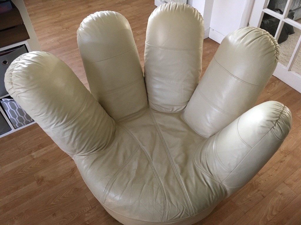 Armchair cream leather hand chair. Comfy and unique swivel chair