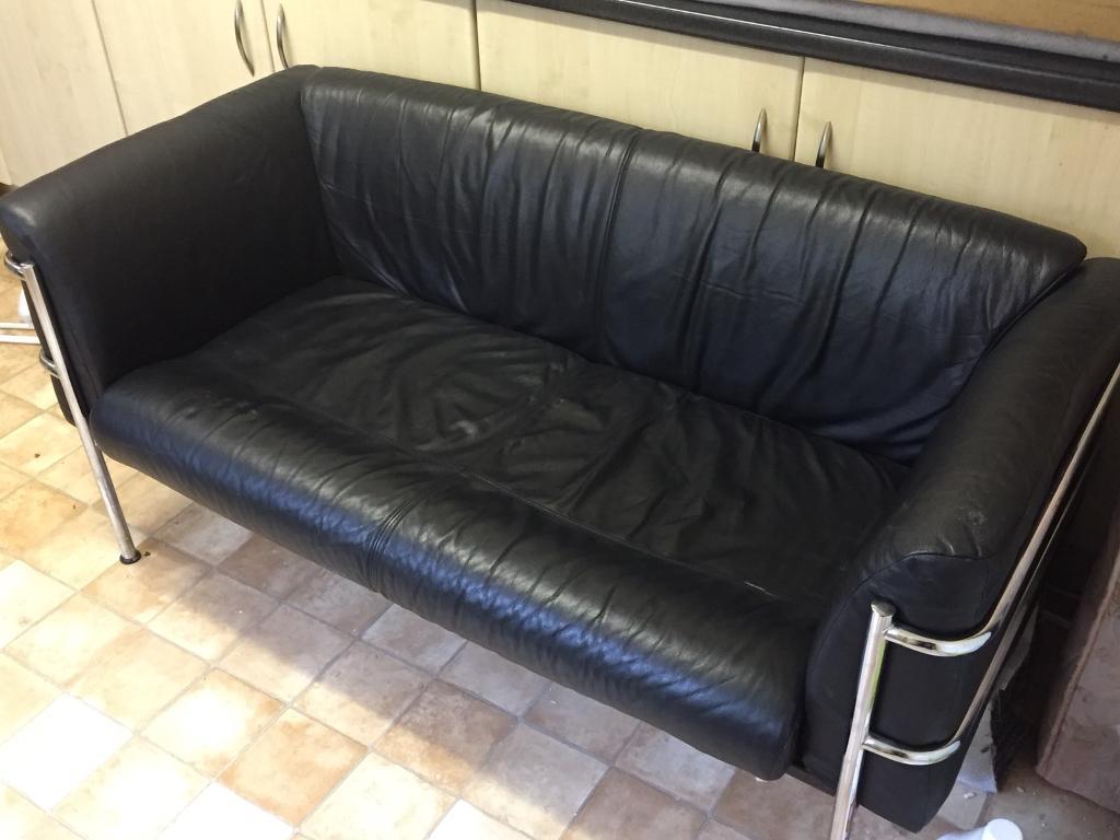 Black leather sofa with chrome frame looks fab!! in Botanic