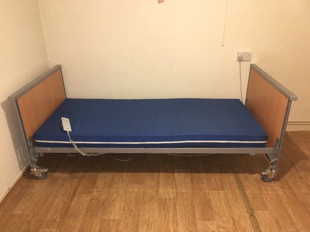 Invacare Medley Ergo Profiling Hospital Nursing Electric Bed With