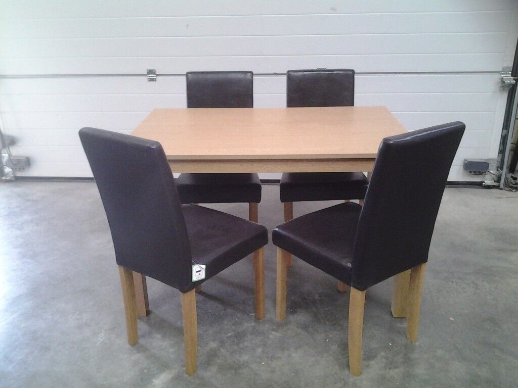 Ex display Dining table and 4 chairs in choc brown faux 