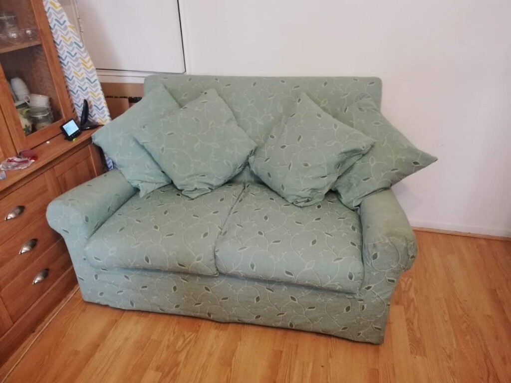 2 Seater SofaBed Light GreenReduced in Clapham, London Gumtree