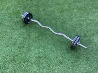 EZ barbell plus weight plates 