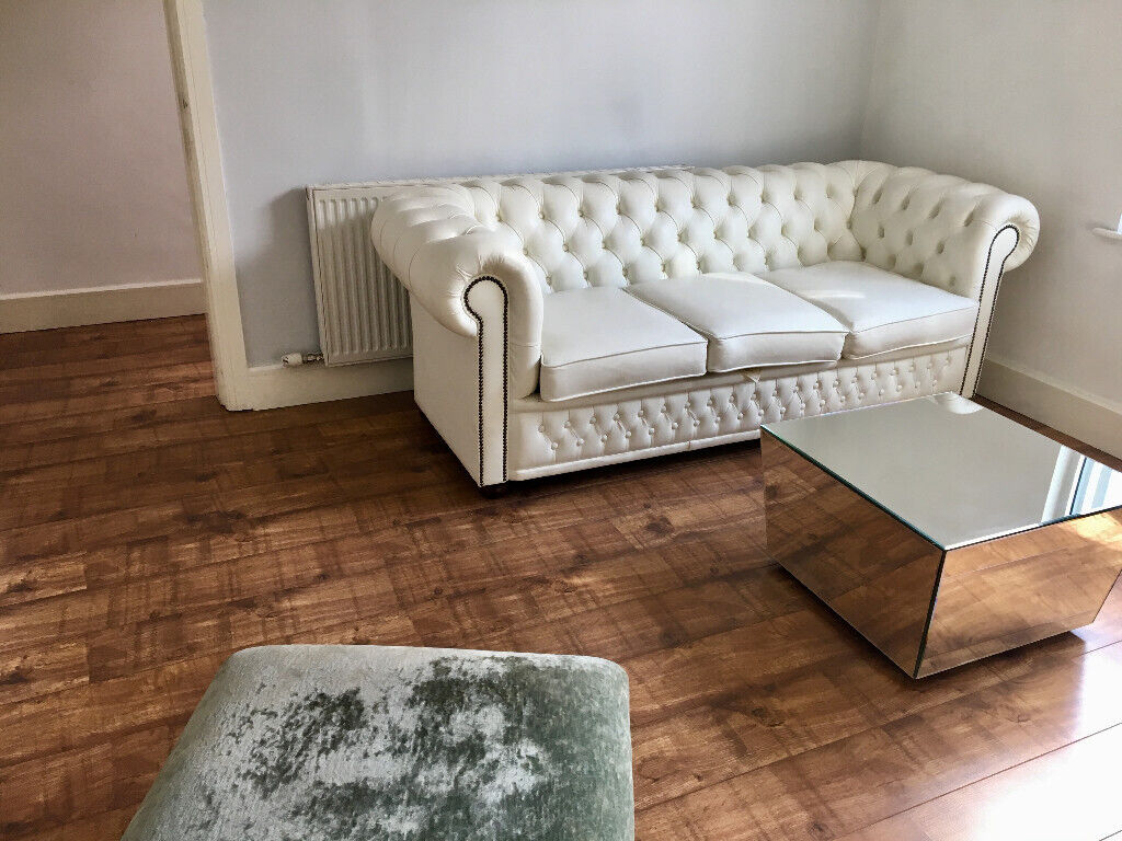 White leather chesterfield style 3 seater sofa in good condition! | in Wilmslow, Cheshire | Gumtree