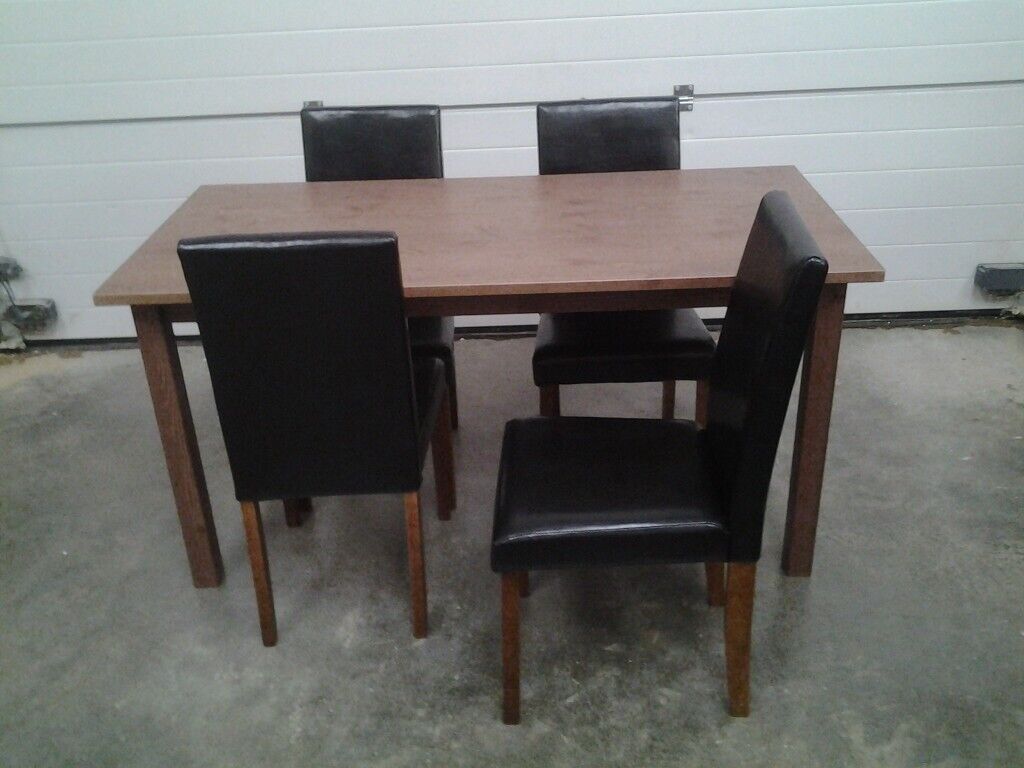 Ex display Bargain Wood dining table and 4 black faux 